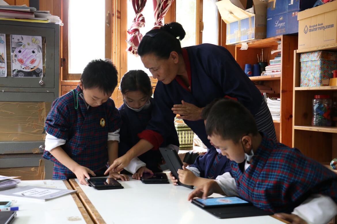Class three students at Wangsel Institute for the Deaf in Bhutan learn to use assistive devices.