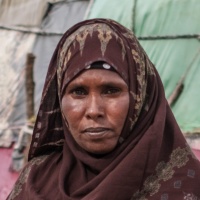Student Hamda’s mother, Halima poses for a photograph near her home In the village of Abaar, 30 kilometres from the city of Hargeisa, in Somaliland, on May 30, 2023. Credit:GPE/AP
