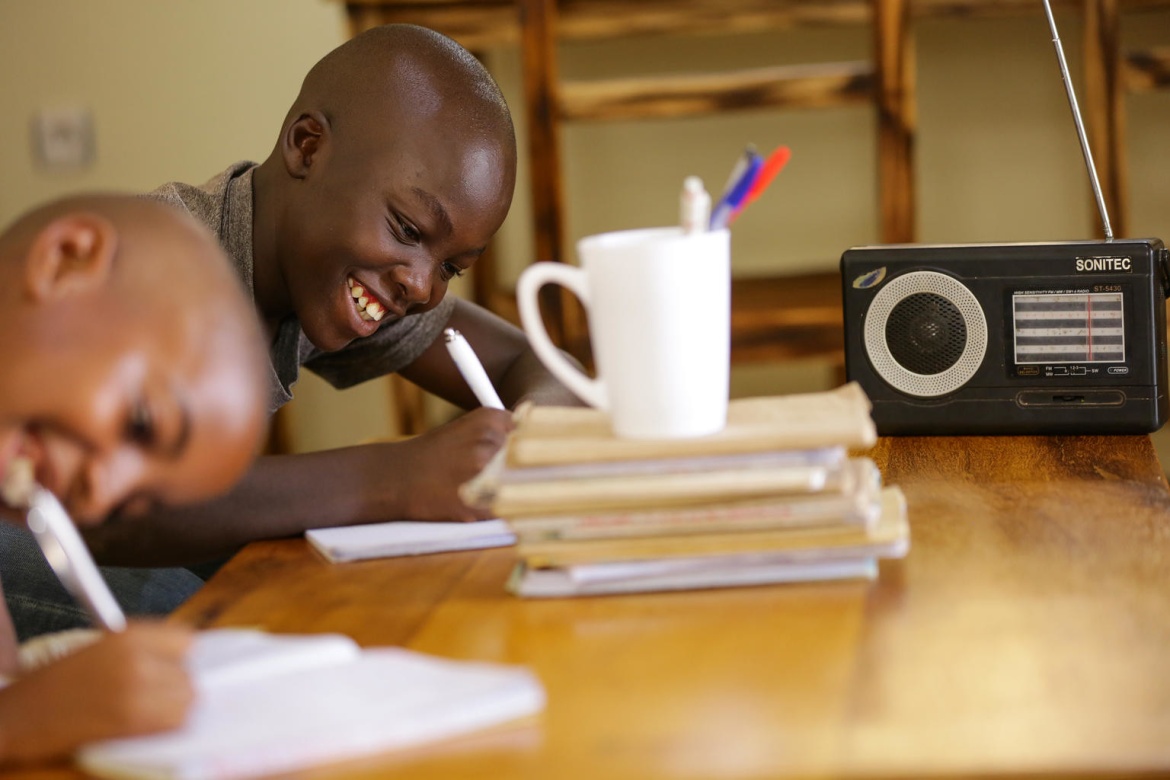 Children like Kevin, 11, listened to radio lessons at home while their primary schools are closed to prevent the spread of COVID-19. Rwanda. Credit: UNICEF/Kanobana