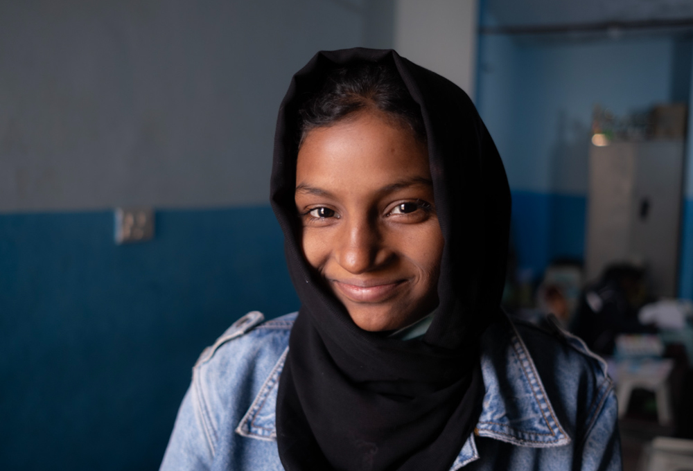 Zahra Asraf, 13, attends grade 3 at the non-formal education center . After school, from 1:30 to about 11 p.m., she works in a dentist’s office as an assistant. Photo Credit: GPE/Sebastian Rich